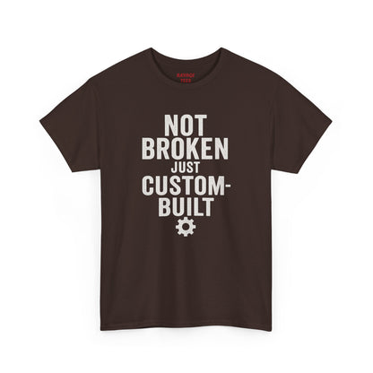“Not Broken Just Custom-Built | Unisex Graphic Tee – Garage Edition